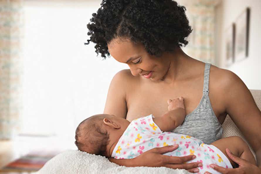 Woman breastfeeding her baby.